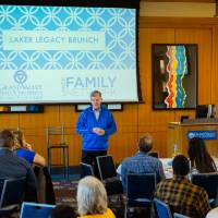 T-Haas speaking in front of a room full of people